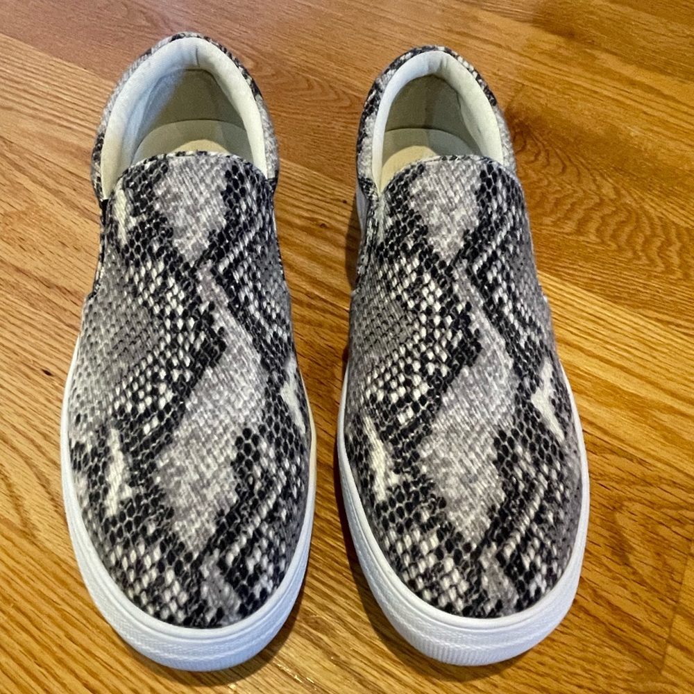 Snake print slip on shoes